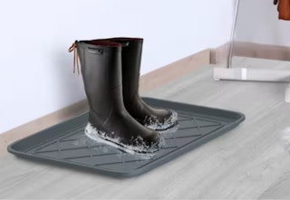 gray boot tray with black winter boots
