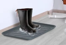 gray boot tray with black winter boots