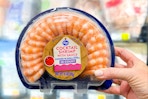 hand holding a kroger shrimp platter