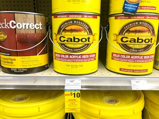 cabot acrylic deck stain gallons on the shelf at ace hardware with a labor day sale sticker