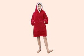 a woman wearing an adult wearable blanket