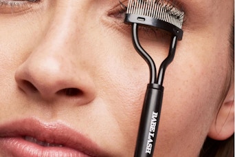 lifestyle image of person using an eyelash separator
