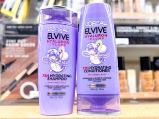 two bottles of l'oreal elvive hair care