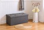 a storage bench in a room