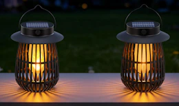 two solar lanterns on a table 