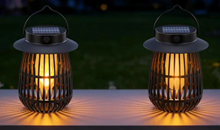 two solar lanterns on a table 