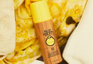 sunscreen on yellow background