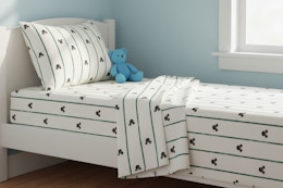 disney sheets on a little girls bed