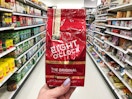 target eight o'clock coffee hand holding