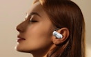 a person with translator earbuds in their ear
