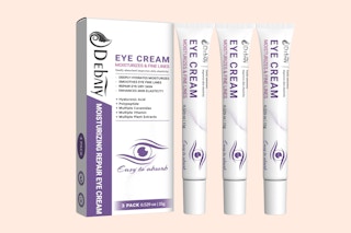 three tubes of eye cream next to a box