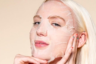 a woman wearing a pacifica sheet mask