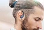 man wearing black wireless earbuds