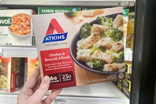 hand holding atkins frozen entree at meijer