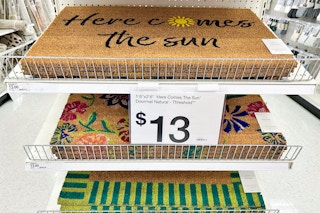 doormats sitting on a target shelf