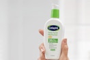 hand holding Cetaphil Face Moisturizer