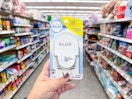 hand holding febreze plug in walgreens
