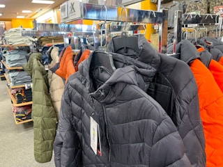 Rack of Zero Xposure puffer jackets