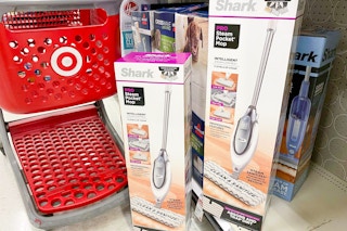 shark pro pocket mop sitting on a target shelf in front of a target cart