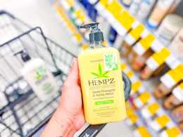 hand holding hempz lotion in walgreens