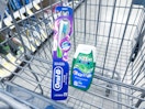 crest and oral-b products in a shopping cart