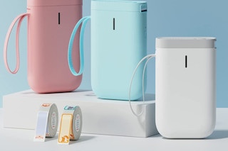 A pack of three label makers in pink, blue, and white