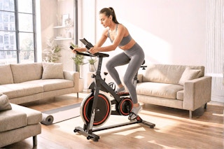 Lifestyle image of a woman on an exercise in her living room