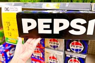 hand holding a pepsi soda 12-pack