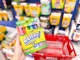 hand holding crayola clicks office depot