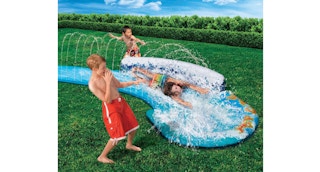 kids playing on a water slide