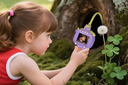 Girl using the Stebeauty Borescope Snake Camera outside.