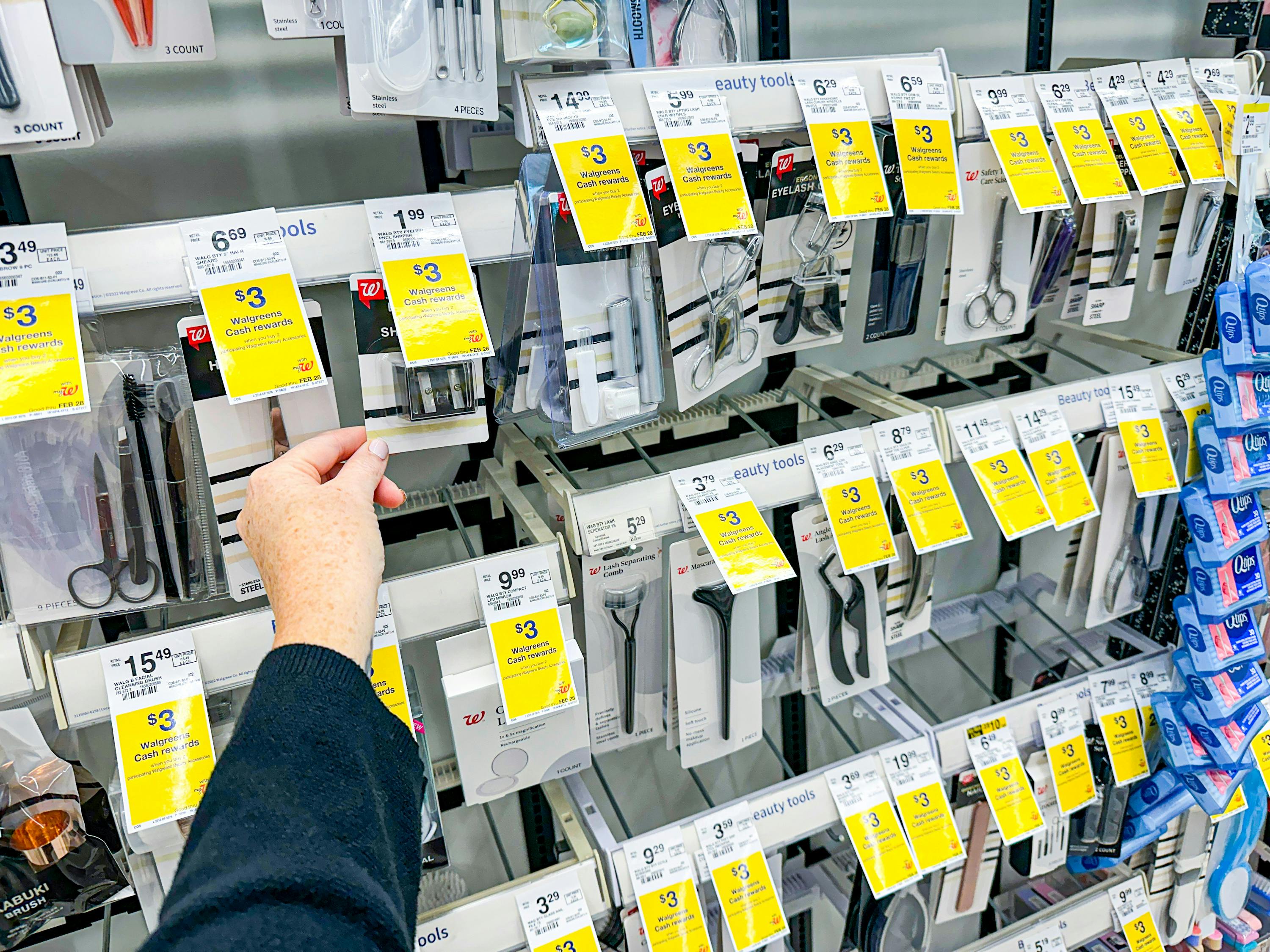 hand holding walgreens beauty eye and lip pencil sharpener
