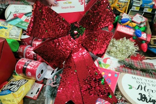 christmas bow above other items at dollar general