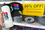 walgreens world cup merch next to a clearance sign