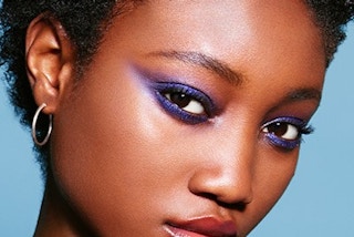 a woman wearing revlon so fierce clap back eyeshadow