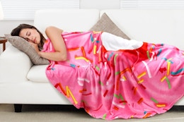 a throw blanket on a couch