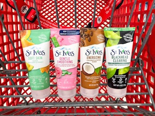 four bottles of st. ives face scrub in a target card