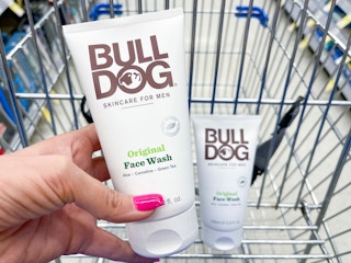 two bottles of bulldog skincare face wash in a cart