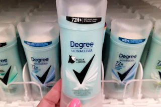 hand holding a stick of degree deodorant