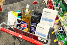 febreze plug, gillette shave foam, ajax dish soap, axe body wash, and aveeno bath treatments in a cart