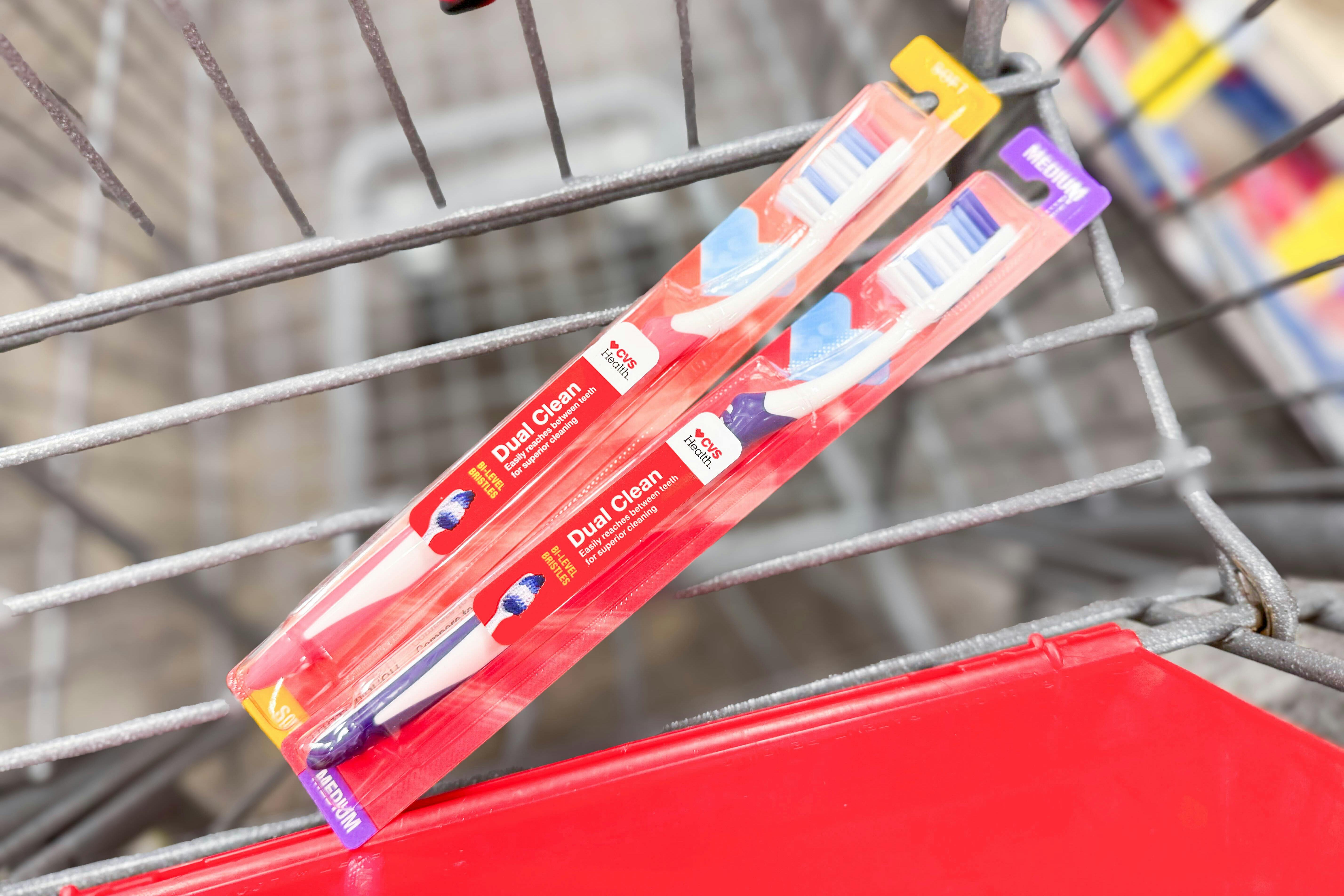 2 toothbrushes in a cart