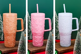 3 lifestyle images of the Holiday Living Christmas Tumblers: Gingerbread Men, Bows & Snowflakes