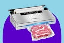 Bonsenkitchen Vacuum Sealer in silver with. bag roll inside and a piece of red meat being sealed