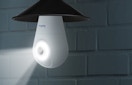 a light bulb security camera in a outdoor lamp post
