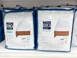 the big one essential mattress pad on shelf