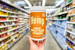 Just Hemp Protein Fiber Powder held up in center isle at Walmart