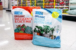2 bags of back to the roots organic potting mix on a floor at target