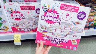 hand holding ryan's world game