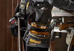 person wearing the DeWalt carpenters tool belt