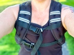 someone wearing a weighted vest with reflectors